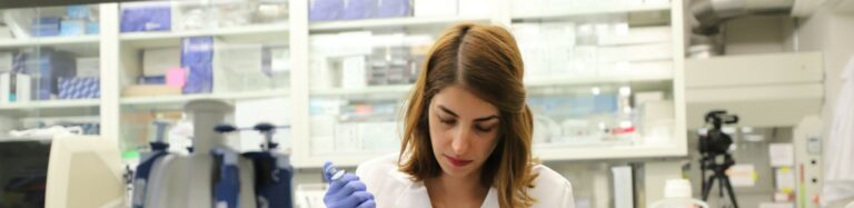 Scientist working in laboratory setting